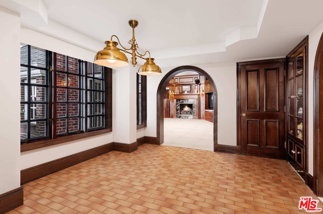 25045 Jim Bridger Road Hidden Hills, CA 91302 - Photo 25 of 52 a bedroom with a bed and a dresser