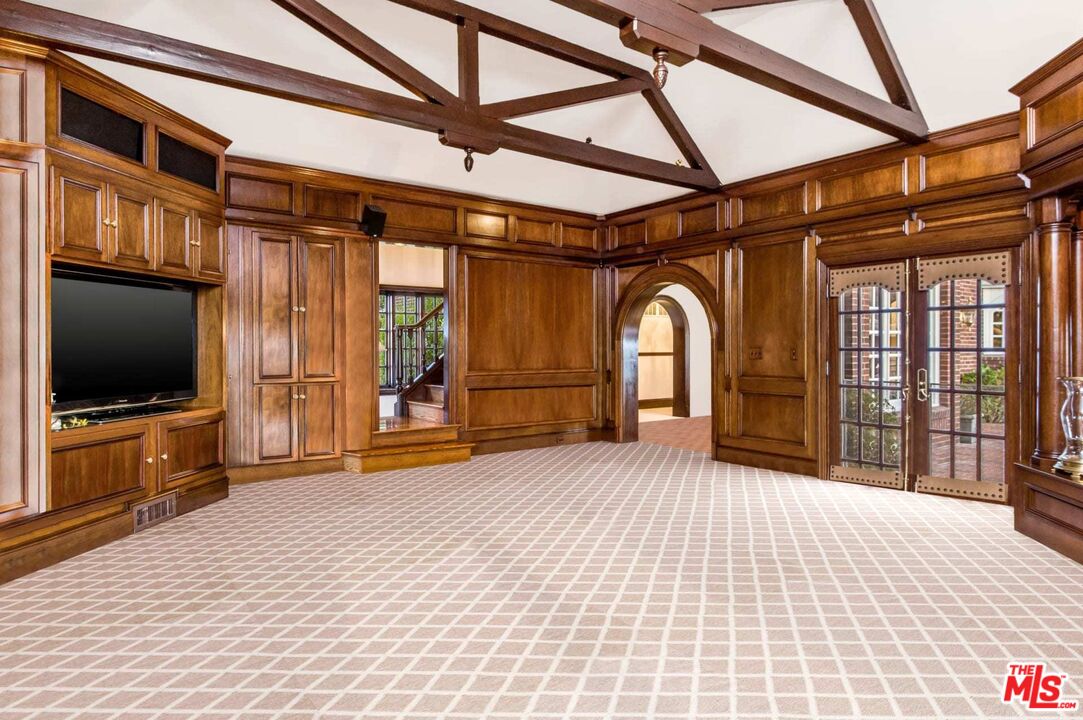 25045 Jim Bridger Road Hidden Hills, CA 91302 - Photo 27 of 52 a view of a livingroom with furniture