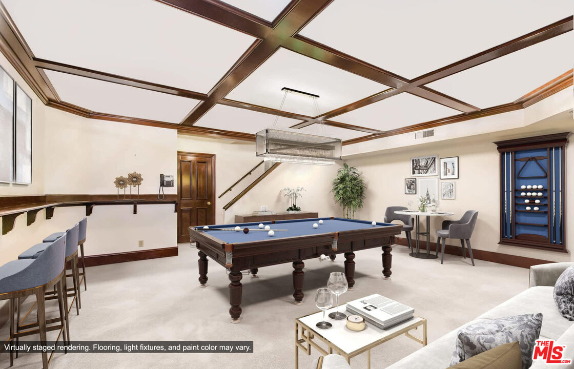 25045 Jim Bridger Road Hidden Hills, CA 91302 - Photo 32 of 52 a living room with furniture and a window