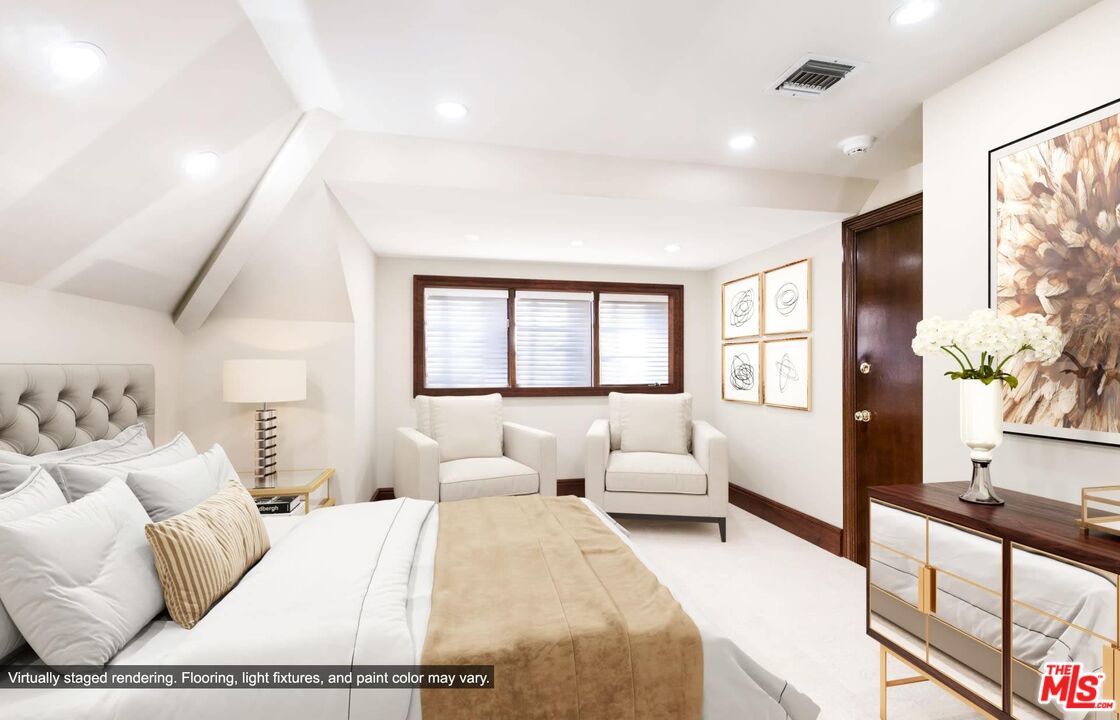 25045 Jim Bridger Road Hidden Hills, CA 91302 - Photo 39 of 52 a bedroom with a large bed and a couch