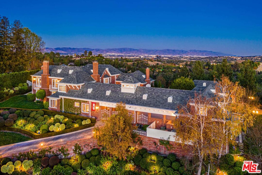 25045 Jim Bridger Road Hidden Hills, CA 91302 - Photo 7 of 52 a view of a city with an ocean view