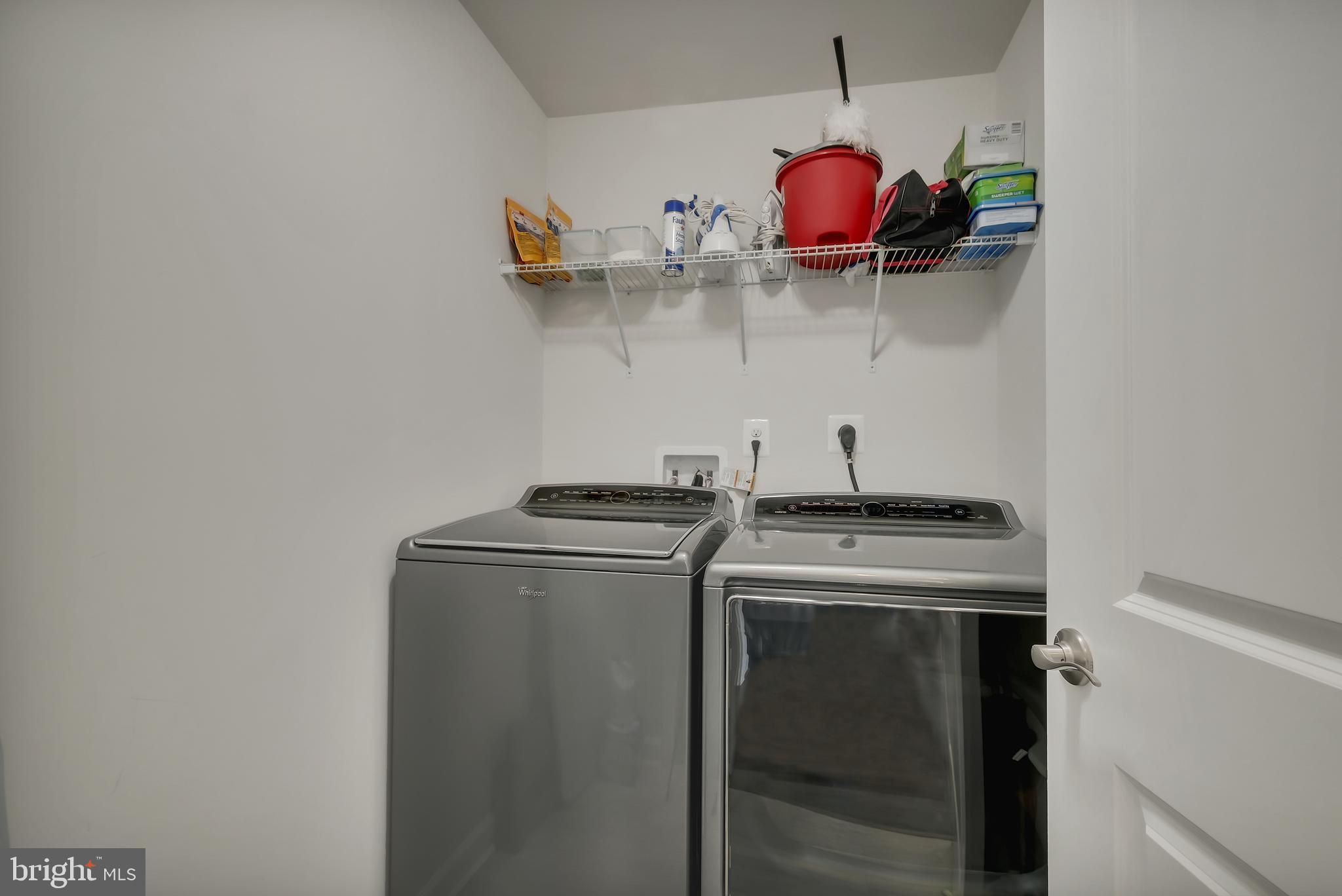 2918 Middleham Court Hanover, MD 21076 - Photo 16 of 37 a kitchen with a stove and a wooden floor