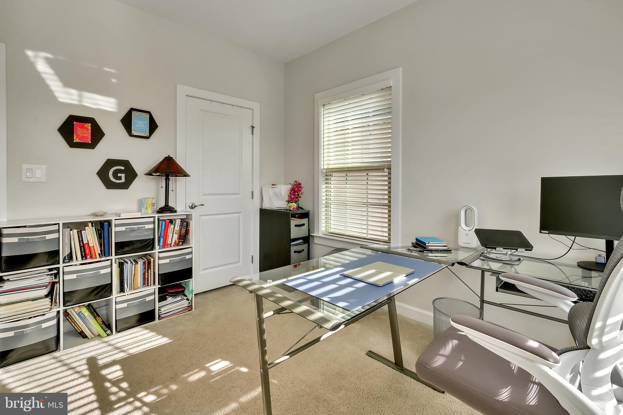 2918 Middleham Court Hanover, MD 21076 - Photo 21 of 37 a living room with lots of furniture and window