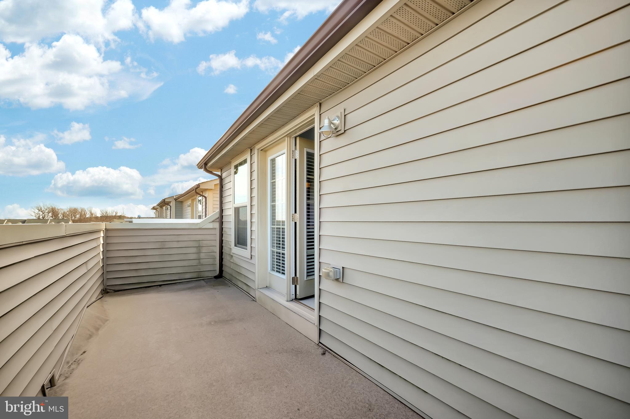 2918 Middleham Court Hanover, MD 21076 - Photo 26 of 37 a view of outdoor space and deck