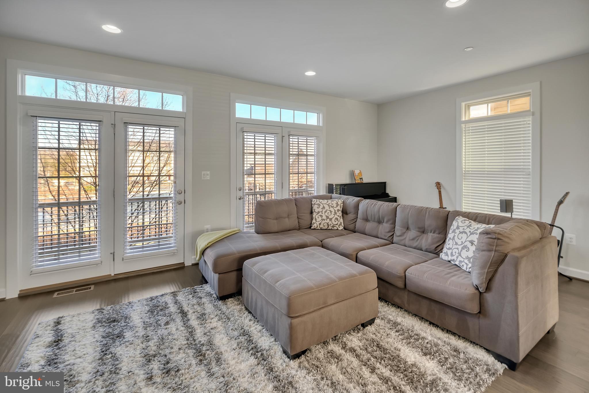 2918 Middleham Court Hanover, MD 21076 - Photo 6 of 37 a living room with furniture and a large window