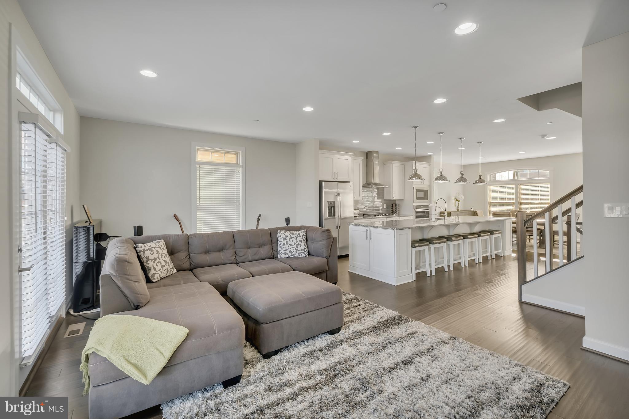 2918 Middleham Court Hanover, MD 21076 - Photo 8 of 37 a living room with furniture and view of kitchen