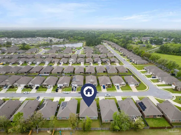 an aerial view of multi story residential apartment building with outdoor space