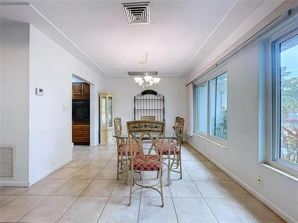 a view of a livingroom with furniture window and outside view