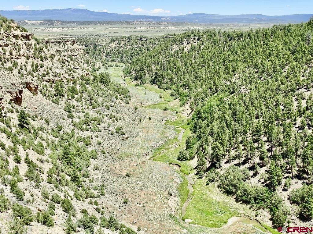 a view of a field with an outdoor space
