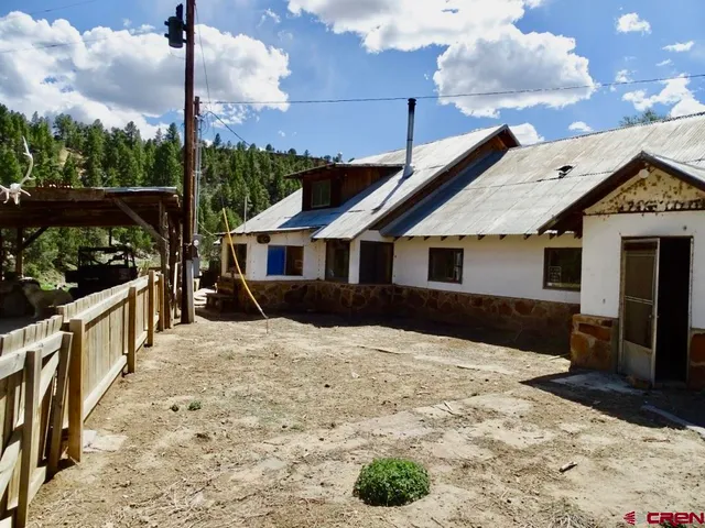 a view of a garden area with potted plants