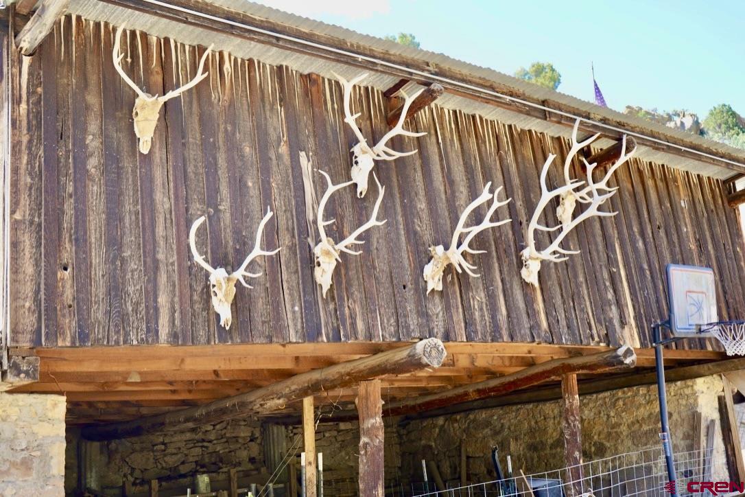 955 County Road 303, Unit CROSS CANYON RANCH Cebolla, NM 87518 - Photo 29 of 44 a view of outdoor space with a table and chairs