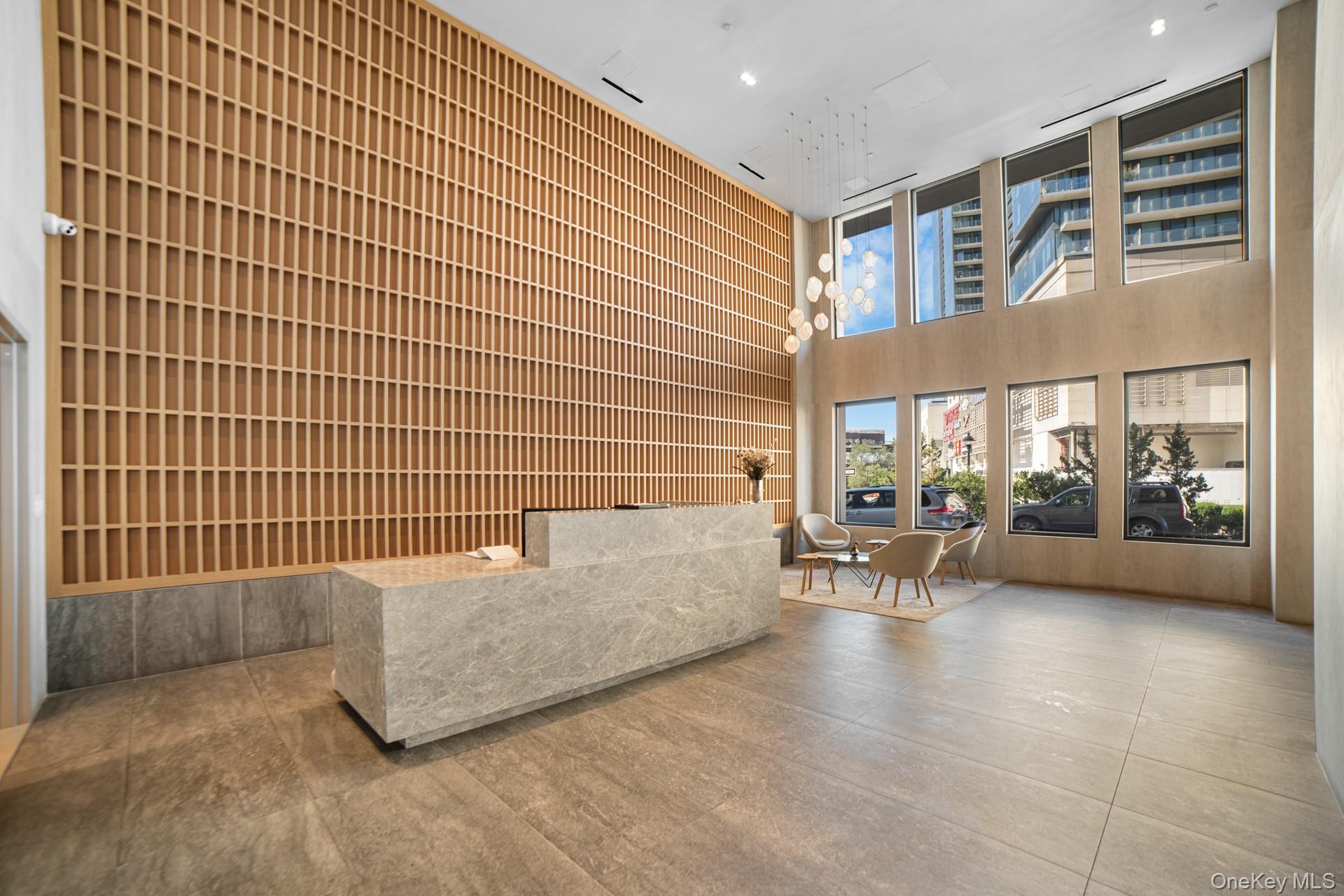 131-02 40th Road, Unit 12G Queens, NY 11354 - Photo 2 of 18 a view of livingroom with furniture