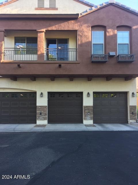 2727 North Price Road, Unit 47 Chandler, AZ 85224 - Photo 20 of 20 Exterior Middle GarageGarage