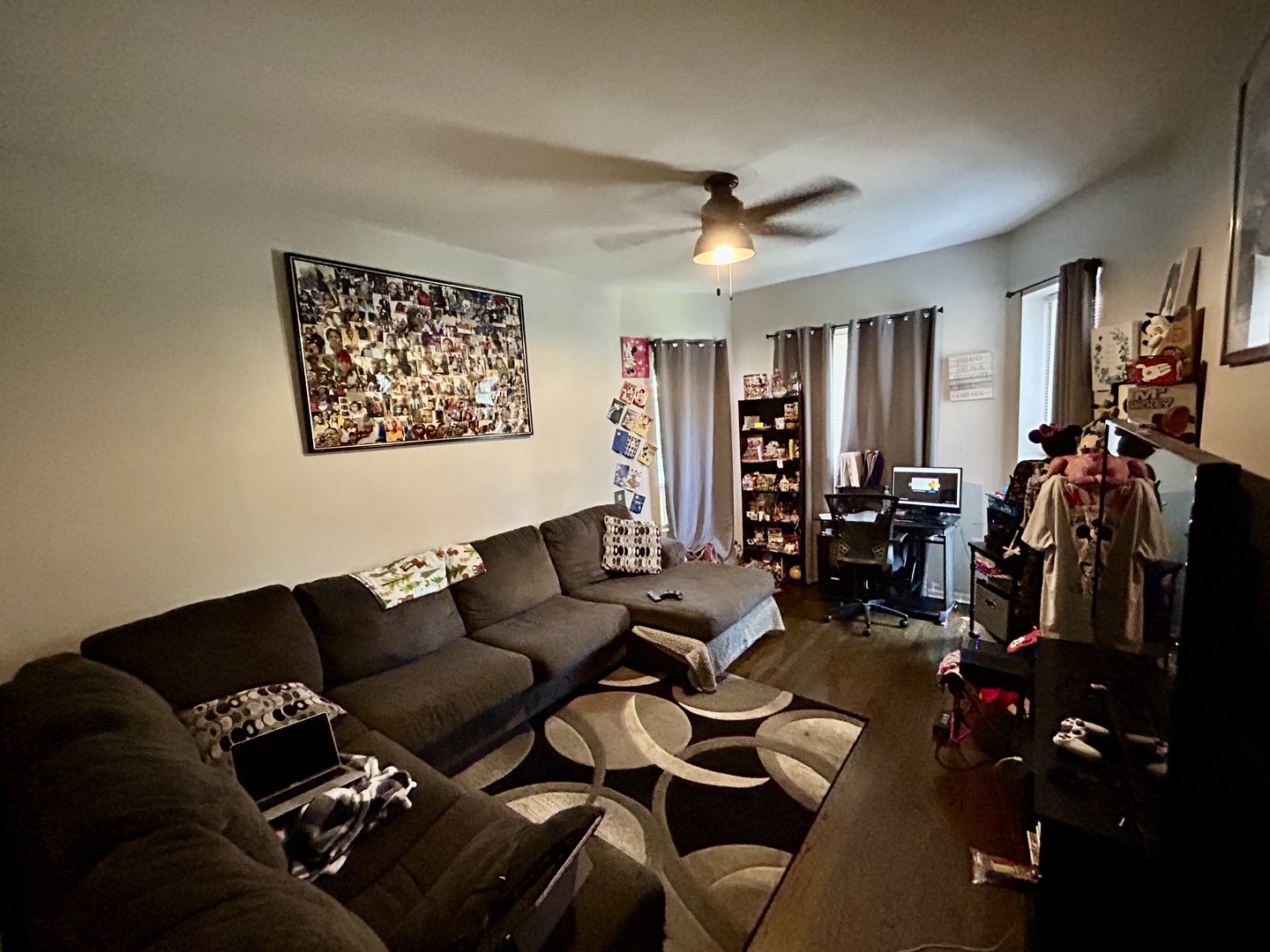 5714 South Prairie Avenue Chicago, IL 60637 - Photo 18 of 39 a living room with furniture ceiling fan and a window