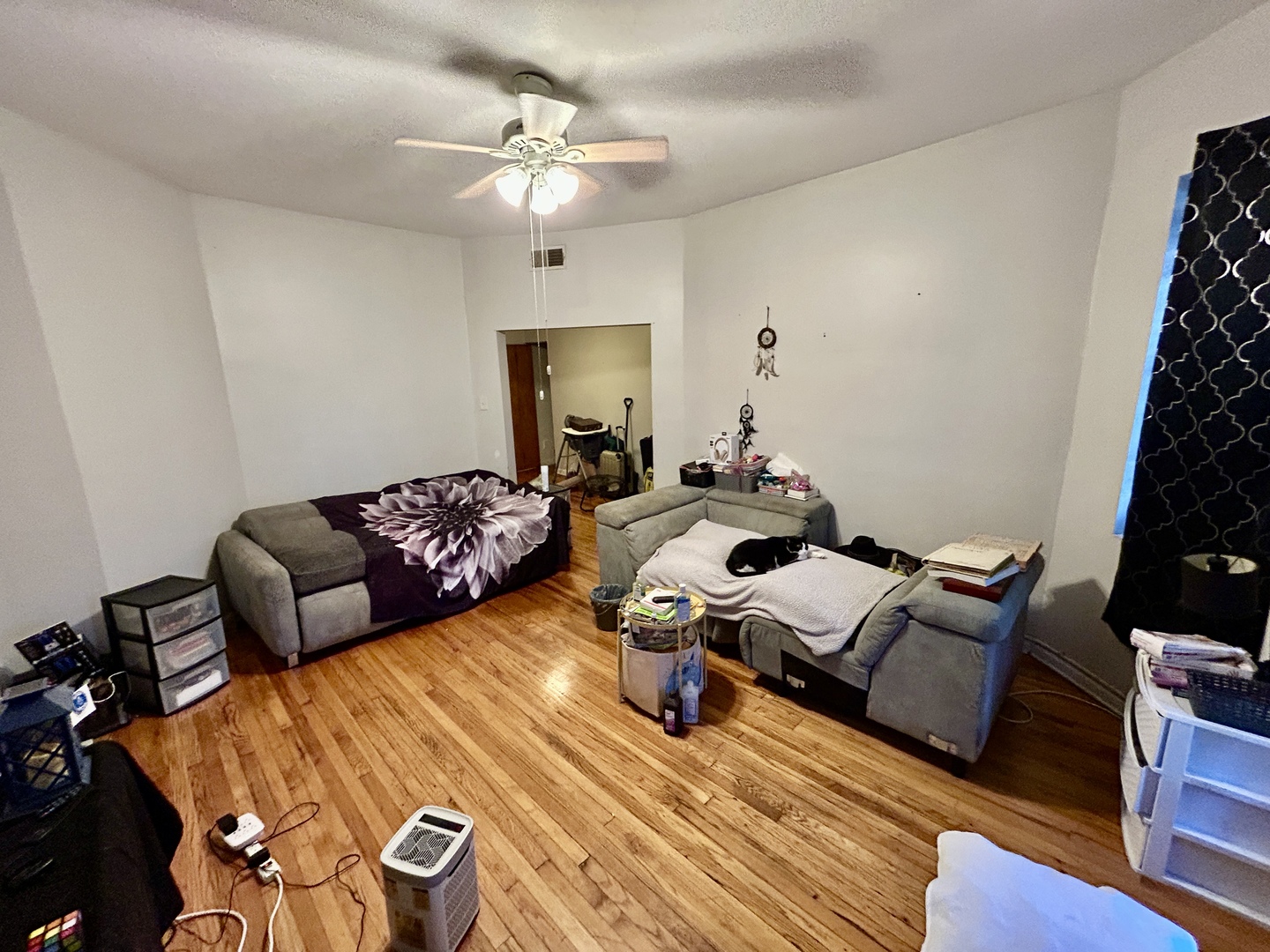 5714 South Prairie Avenue Chicago, IL 60637 - Photo 23 of 39 a bedroom with furniture and a chandelier