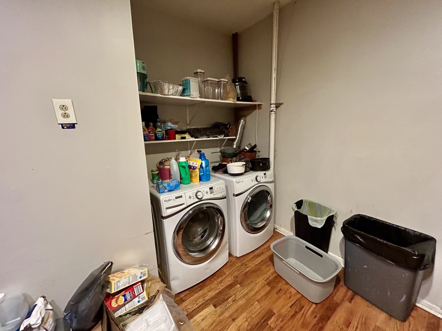 5714 South Prairie Avenue Chicago, IL 60637 - Photo 26 of 39 a utility room with dryer washer and shoe rack