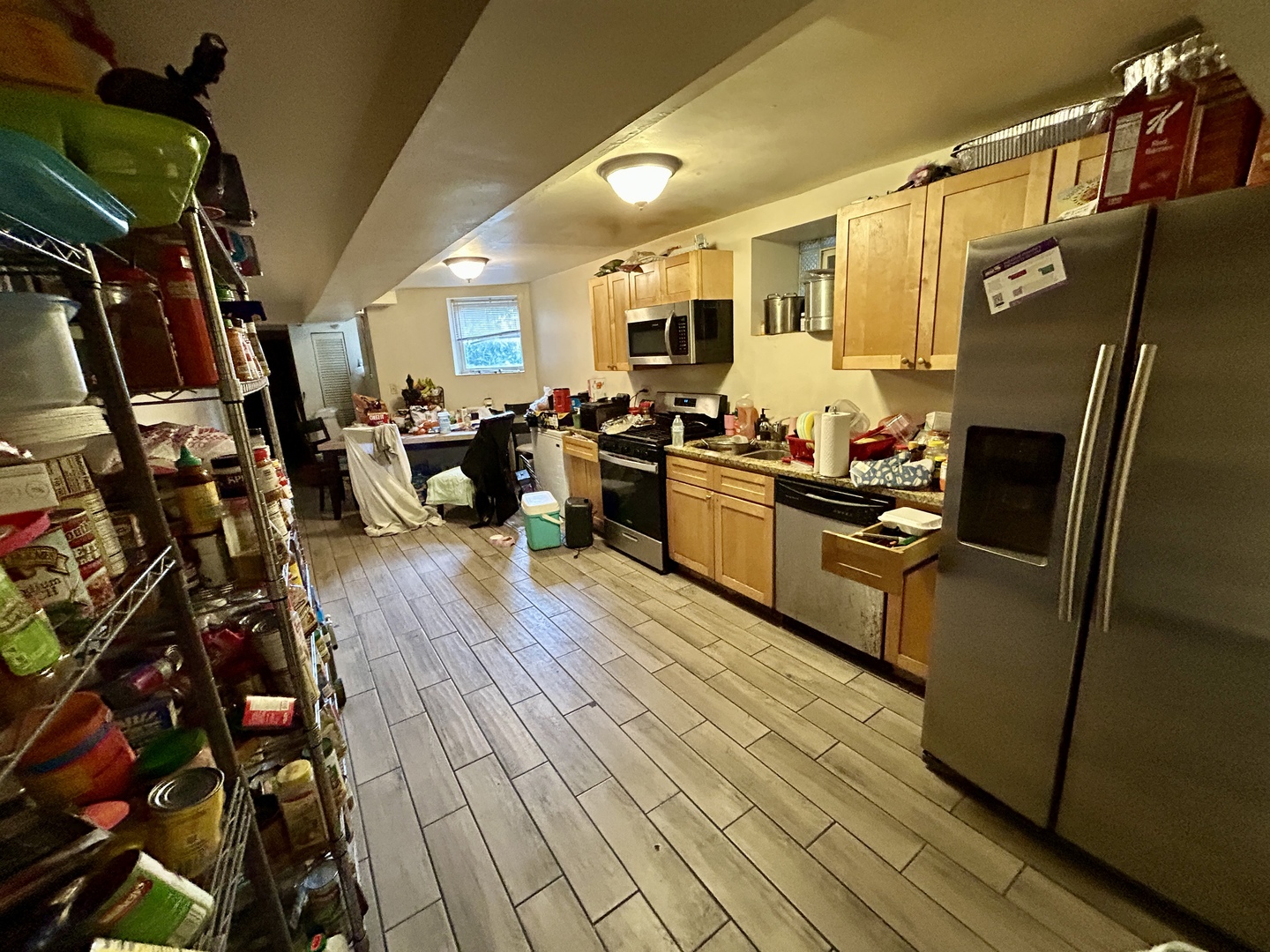 5714 South Prairie Avenue Chicago, IL 60637 - Photo 30 of 39 a living room with lots of furniture and appliances