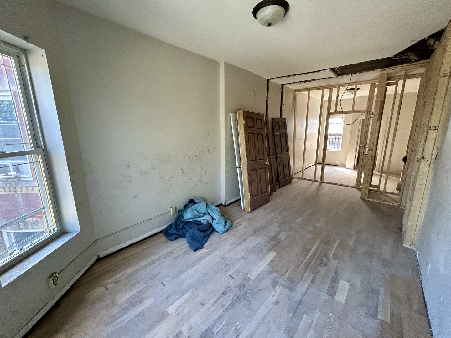 5714 South Prairie Avenue Chicago, IL 60637 - Photo 4 of 39 a view of empty room with wooden floor and fan