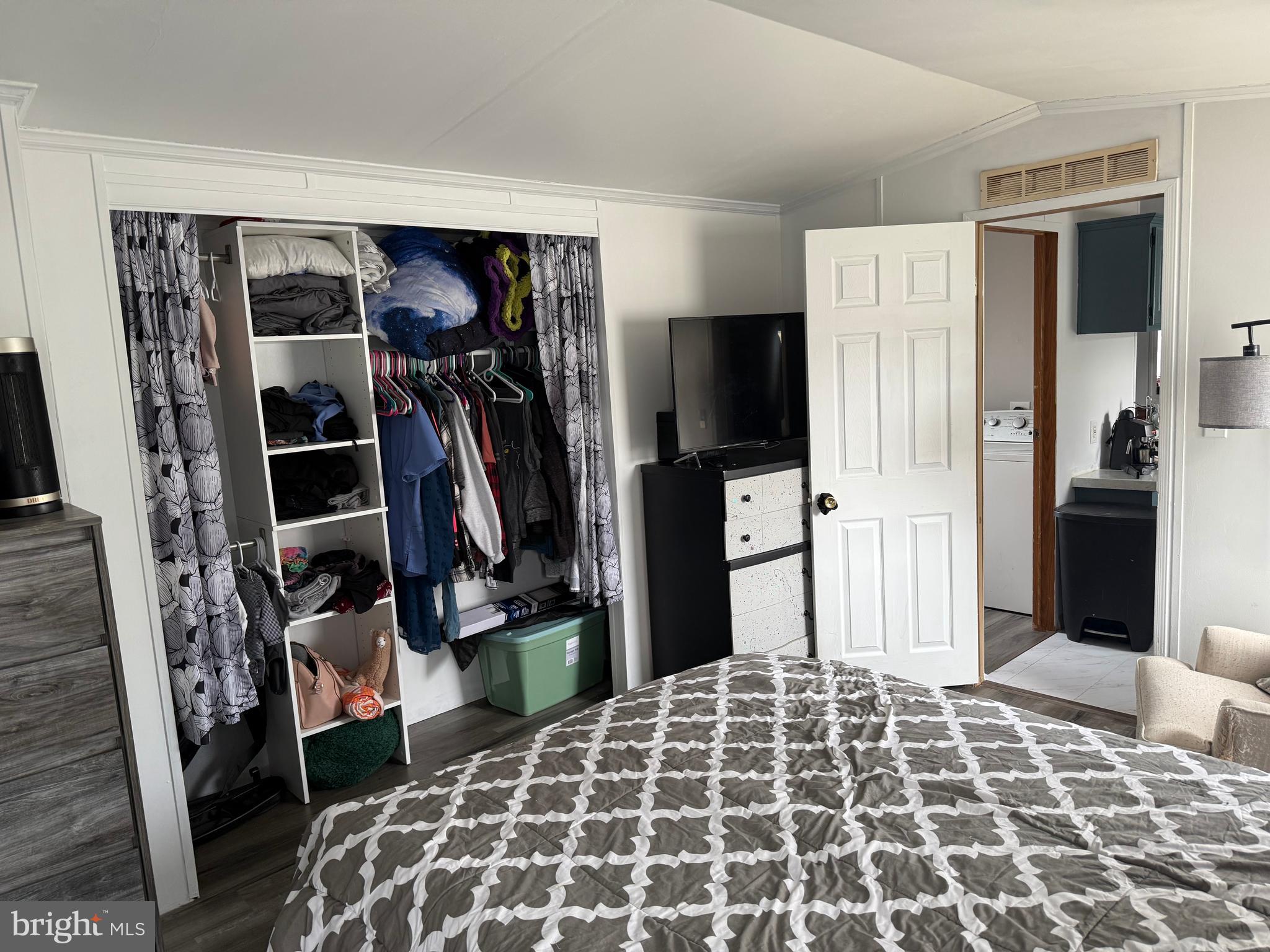 938 Decoy Way, Unit A161 Bear, DE 19701 - Photo 11 of 17 a bedroom with a bed and a closet