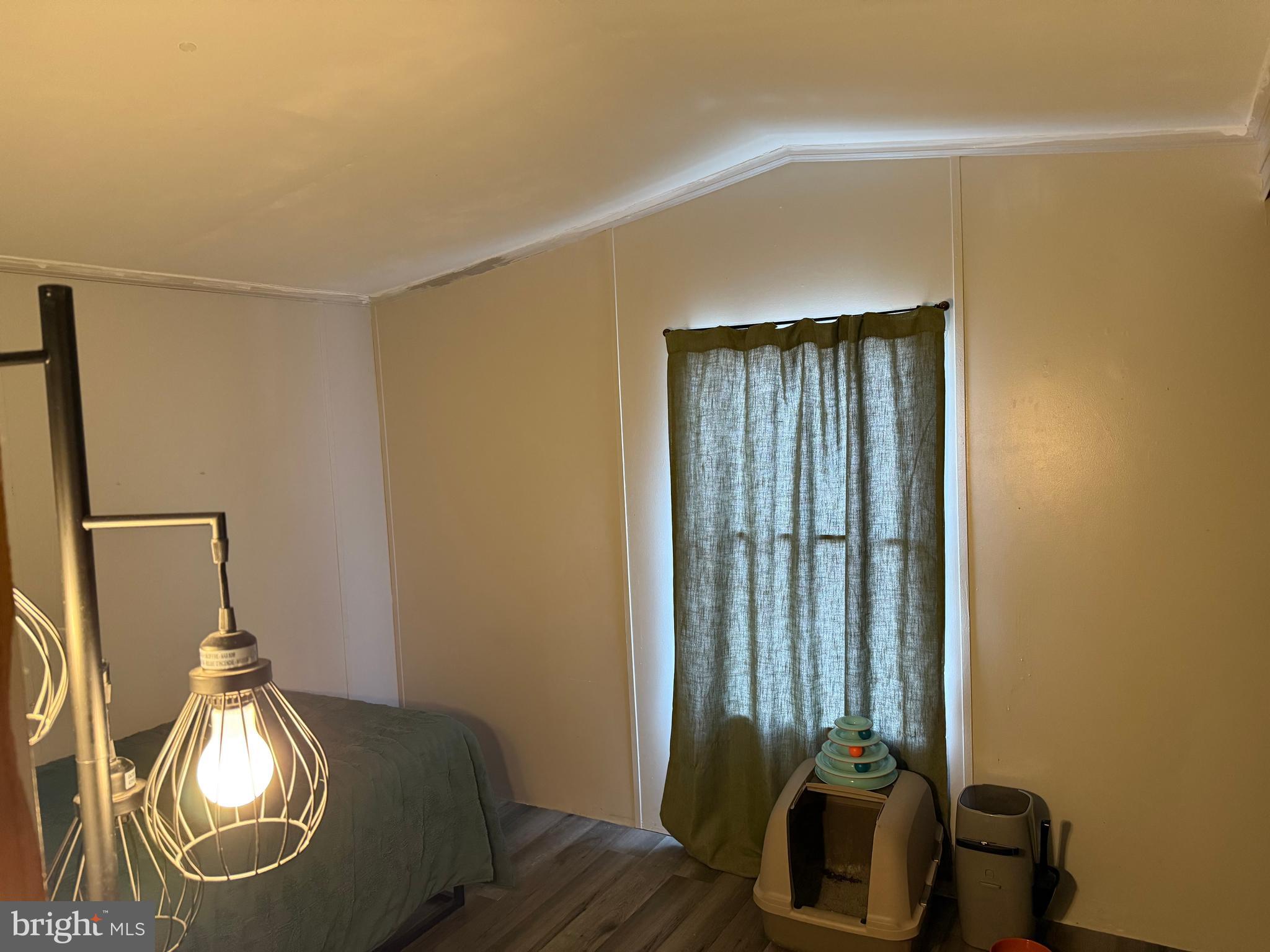 938 Decoy Way, Unit A161 Bear, DE 19701 - Photo 15 of 17 a room with wooden floor and windows