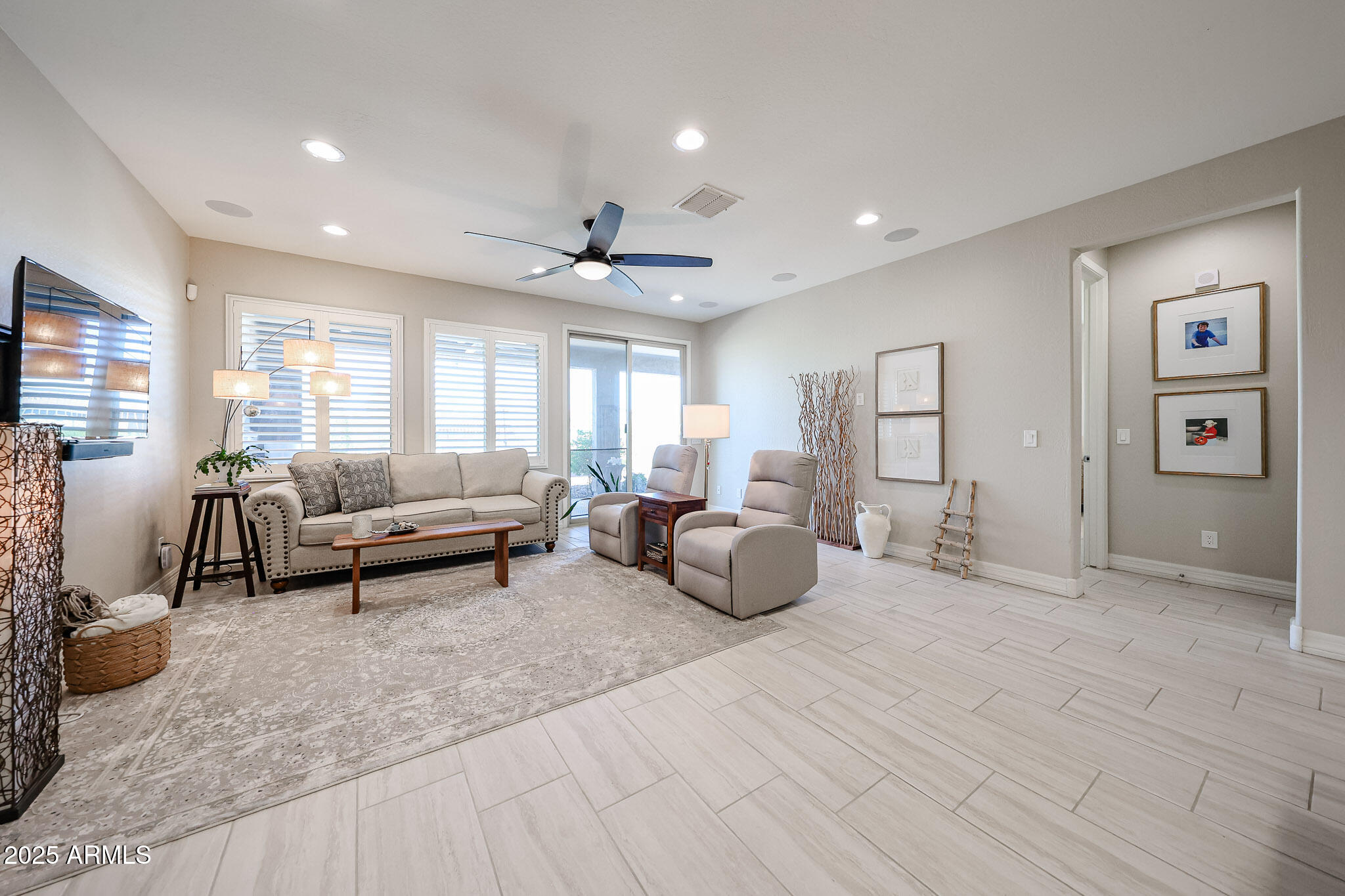 18184 West Deer Creek Road Goodyear, AZ 85338 - Photo 24 of 82 a view of a livingroom with furniture and windows