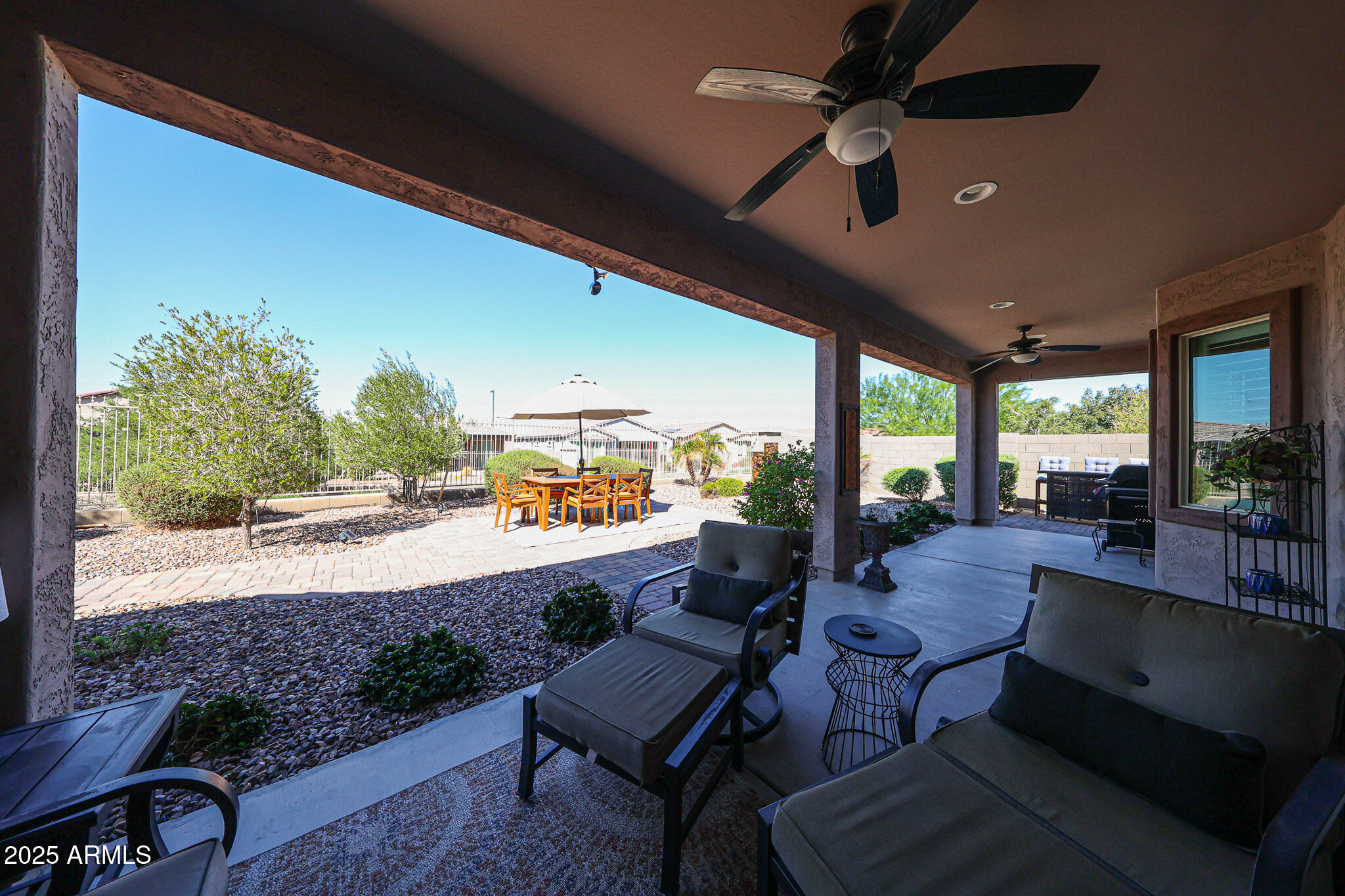 18184 West Deer Creek Road Goodyear, AZ 85338 - Photo 50 of 82 a outdoor space with furniture