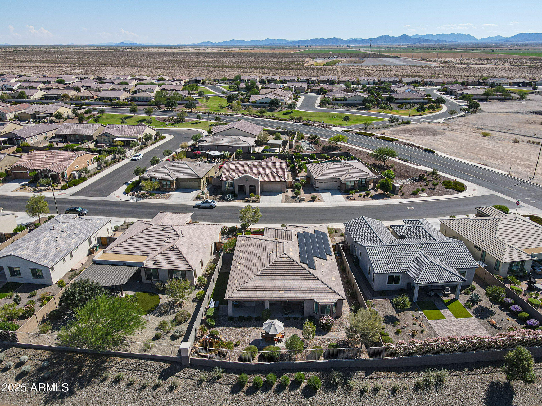 18184 West Deer Creek Road Goodyear, AZ 85338 - Photo 55 of 82 an aerial view of residential building and lake