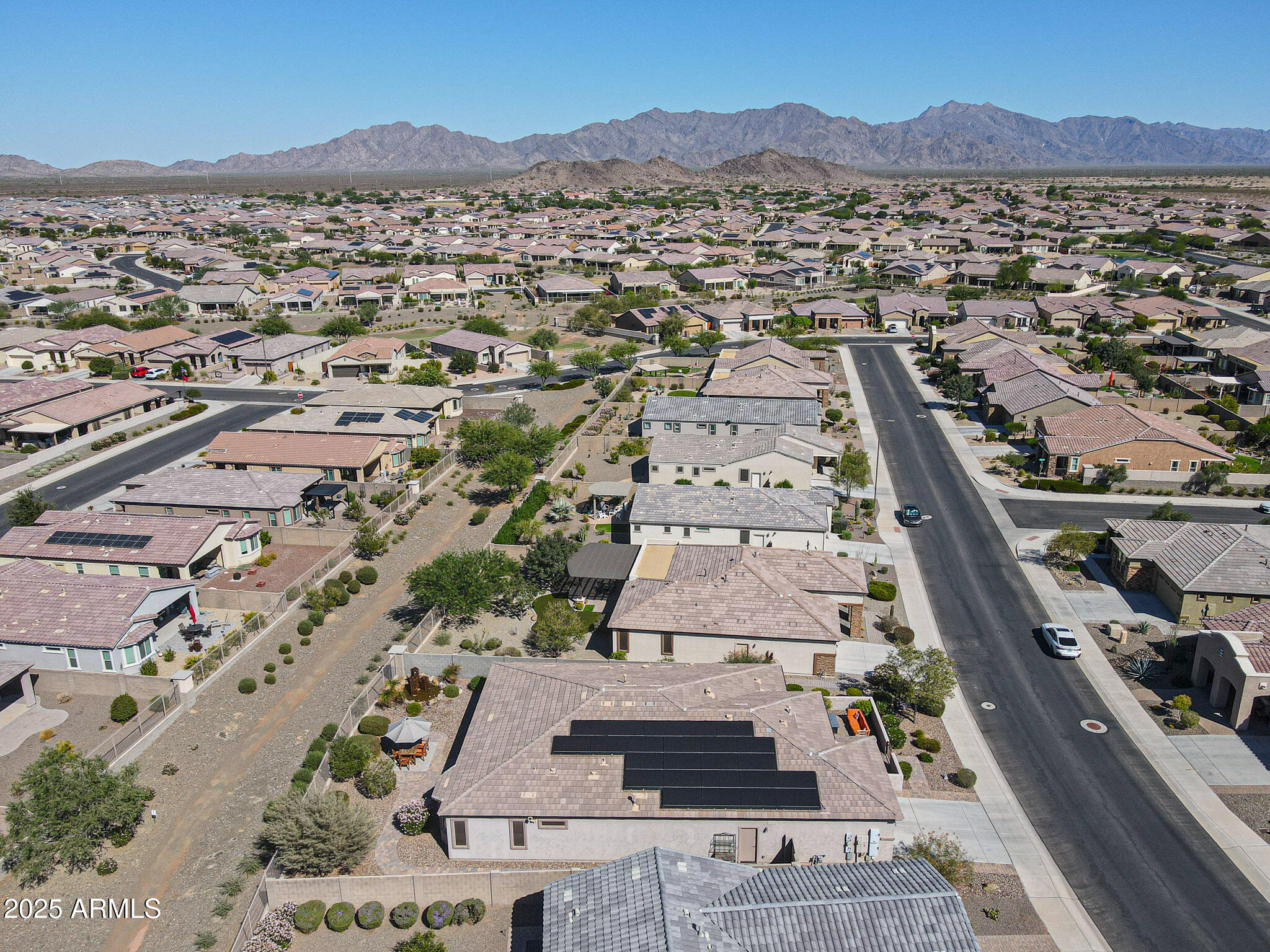 18184 West Deer Creek Road Goodyear, AZ 85338 - Photo 57 of 82 an aerial view of residential houses with outdoor space