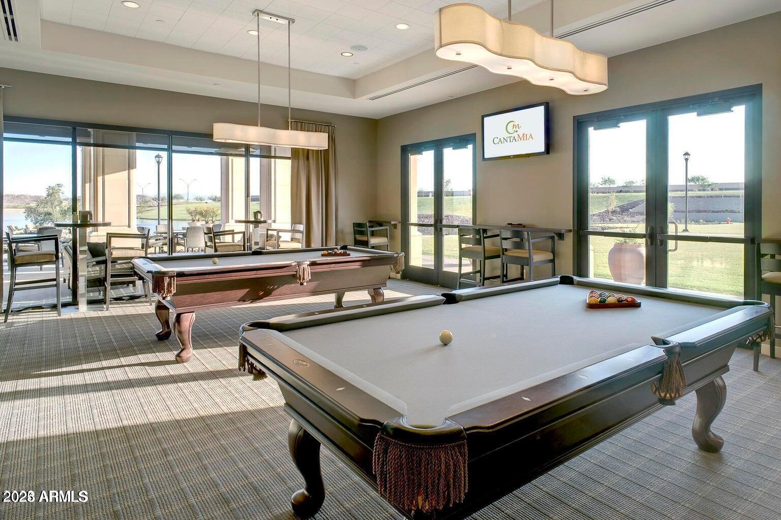 18184 West Deer Creek Road Goodyear, AZ 85338 - Photo 64 of 82 a room with pool table and windows