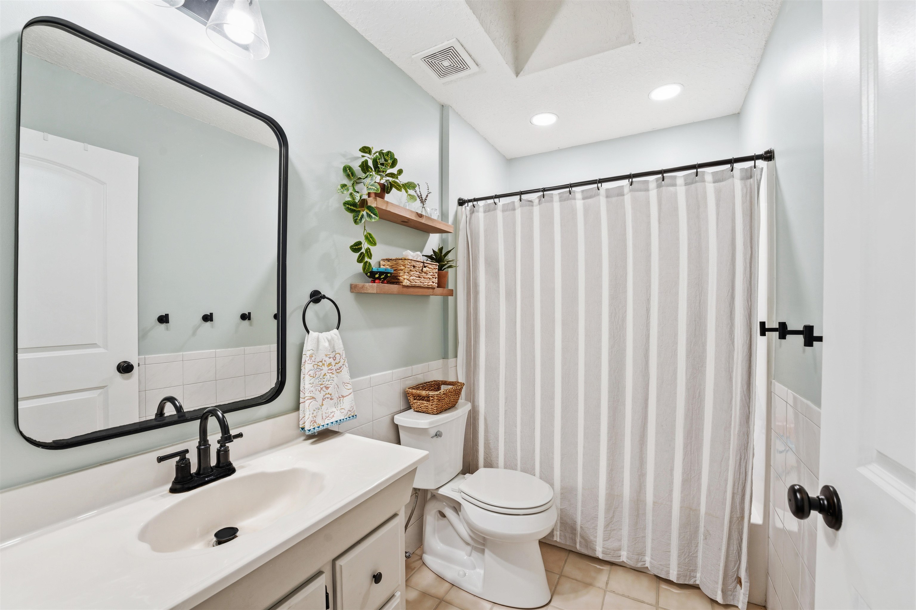 1805 Bennett Road St. Augustine, FL 32092 - Photo 32 of 65 a bathroom with a sink a toilet and shower