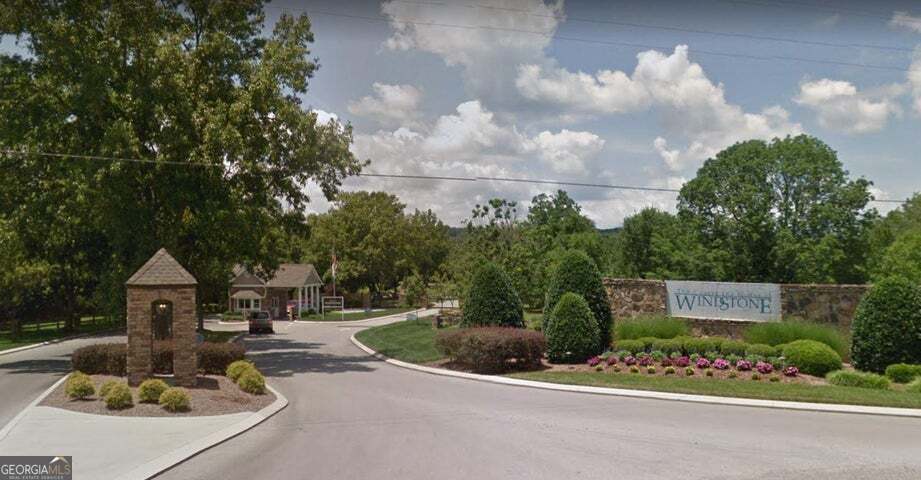 0 Blue Jay Parkway Ringgold, GA 30736 - Photo 3 of 6 a front view of a house with garden