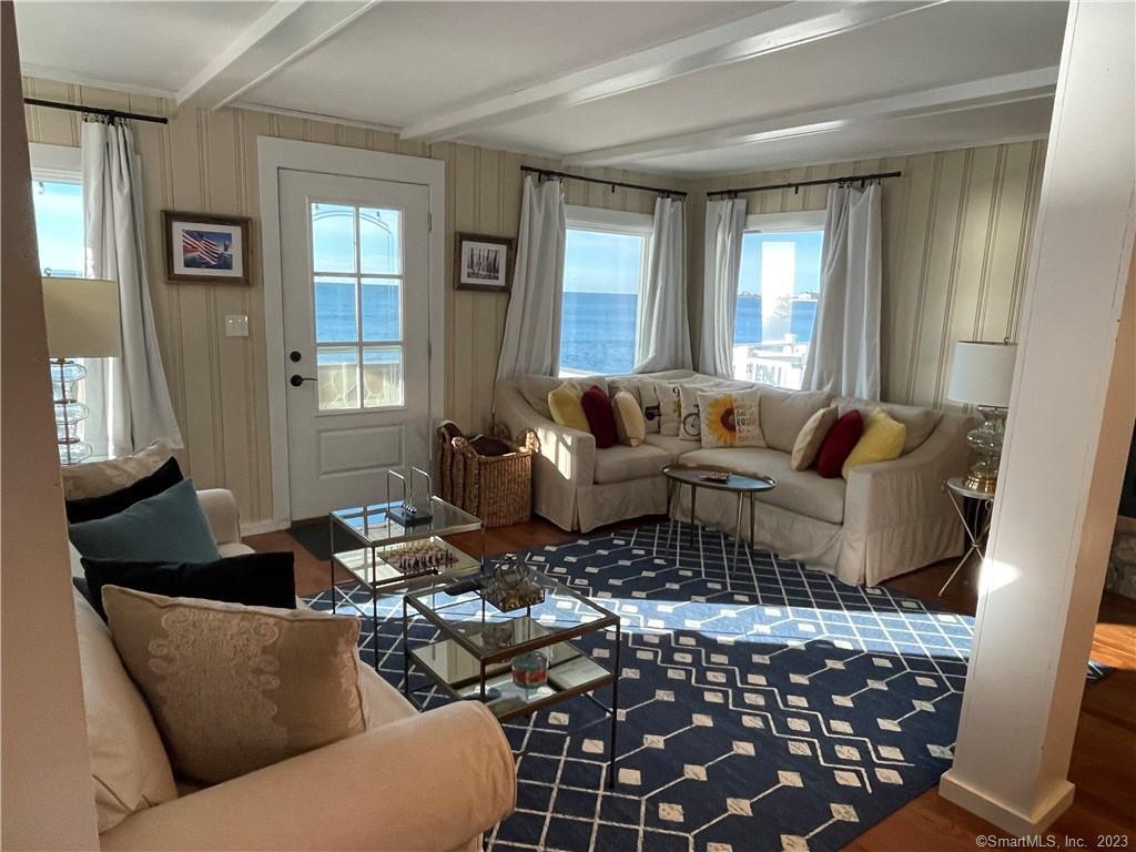 59 Melba Street Milford, CT 06460 - Photo 15 of 38 a living room with furniture and a window