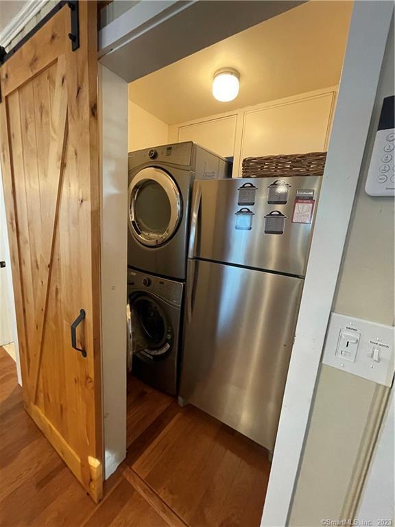 59 Melba Street Milford, CT 06460 - Photo 17 of 38 a utility room with dryer and washer