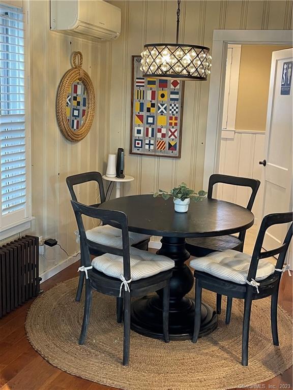 59 Melba Street Milford, CT 06460 - Photo 19 of 38 a view of a dining room with furniture and wooden floor