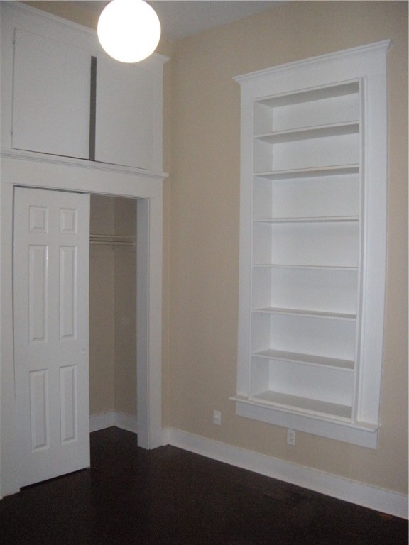 915 West 23rd Street, Unit C Austin, TX 78705 - Photo 14 of 22 a view of a room with rack on the wall