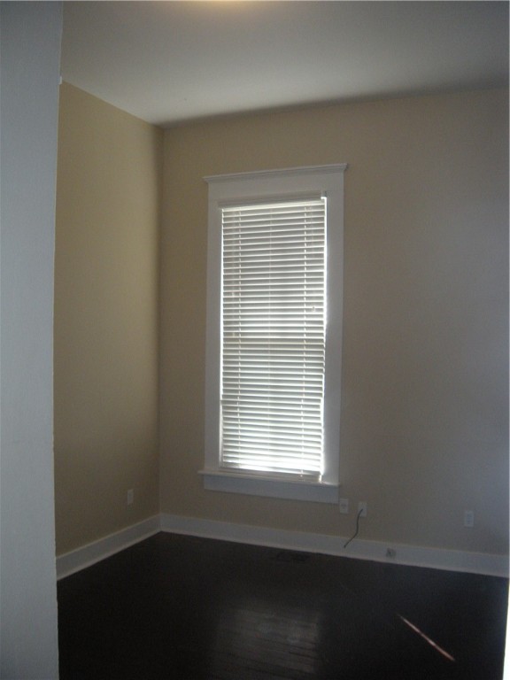 915 West 23rd Street, Unit C Austin, TX 78705 - Photo 18 of 22 an empty room with a window
