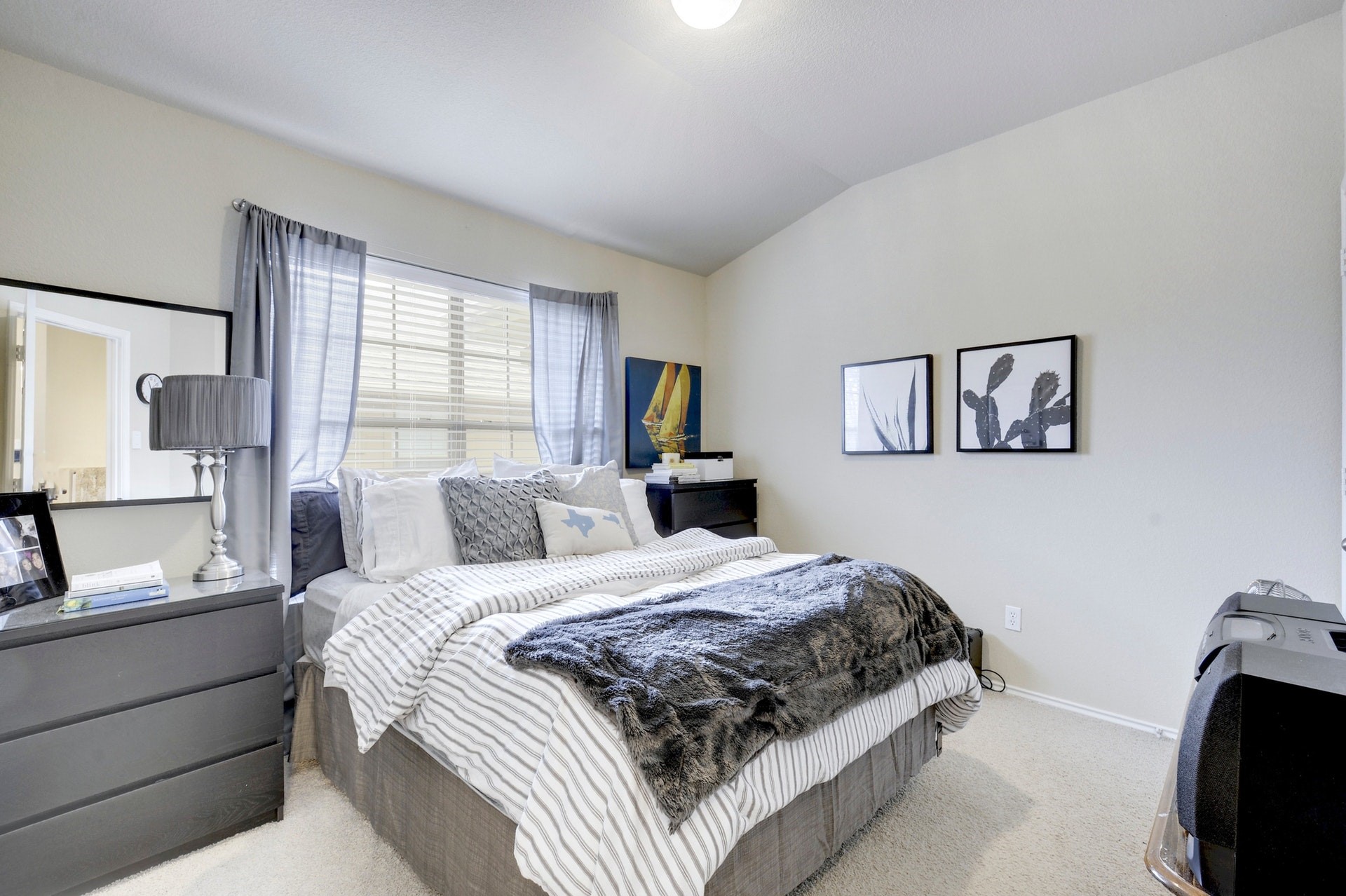 14815 Avery Ranch Boulevard, Unit 1103 Austin, TX 78717 - Photo 21 of 25 a bedroom with a bed and a window