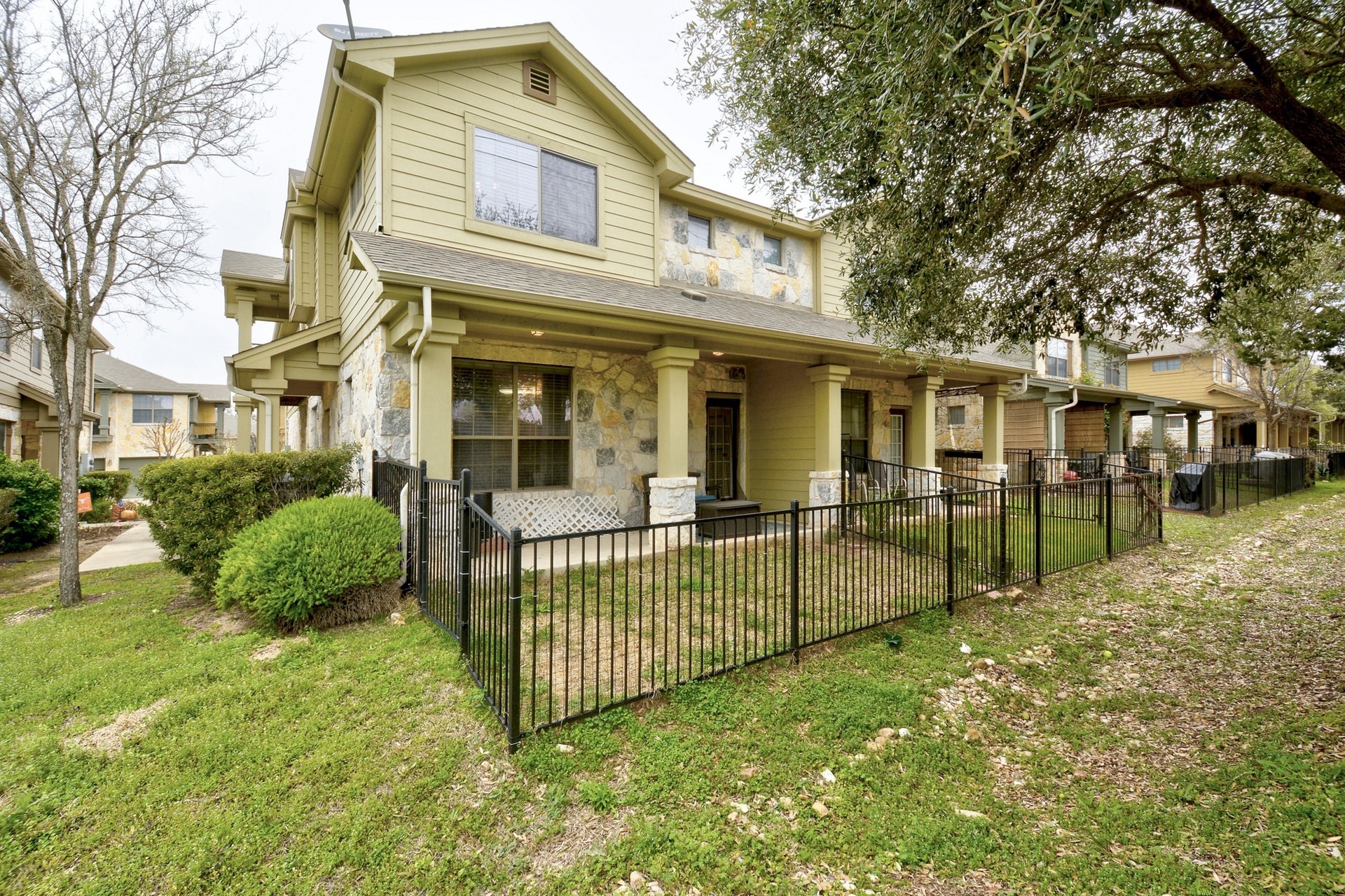 14815 Avery Ranch Boulevard, Unit 1103 Austin, TX 78717 - Photo 23 of 25 front view of a house with a yard