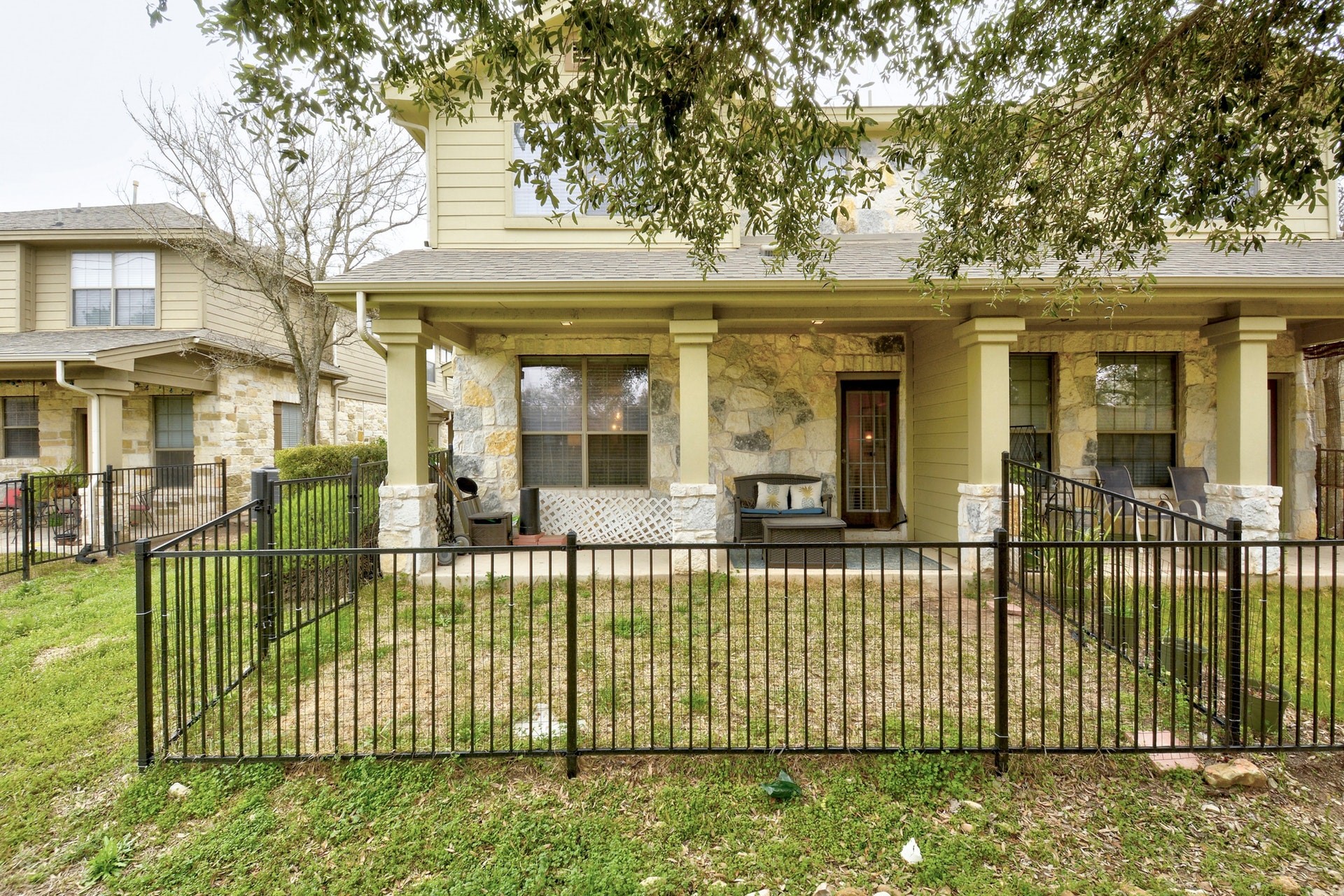 14815 Avery Ranch Boulevard, Unit 1103 Austin, TX 78717 - Photo 24 of 25 front view of a house with a garden
