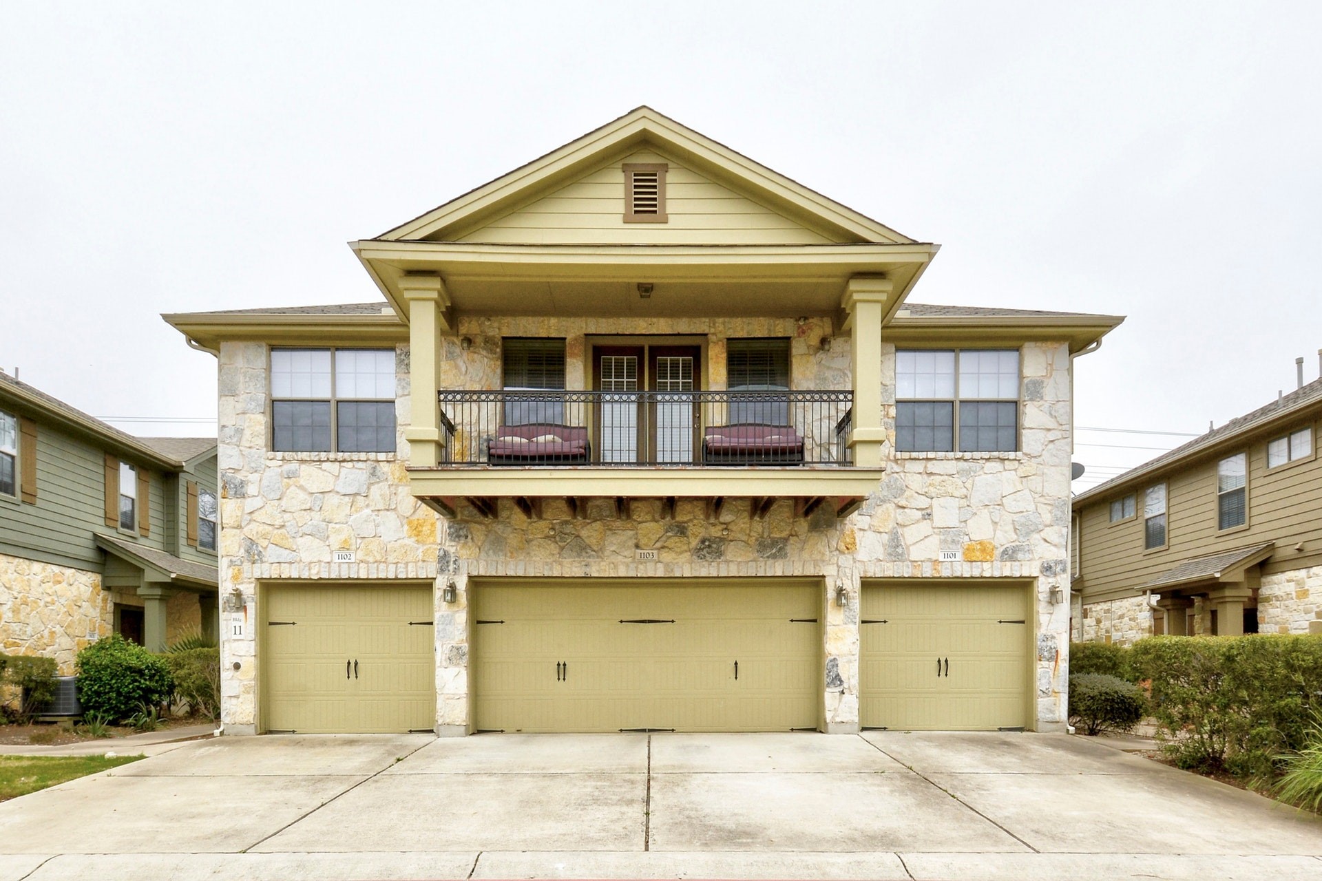 14815 Avery Ranch Boulevard, Unit 1103 Austin, TX 78717 - Photo 3 of 25 a front view of a house with a garage