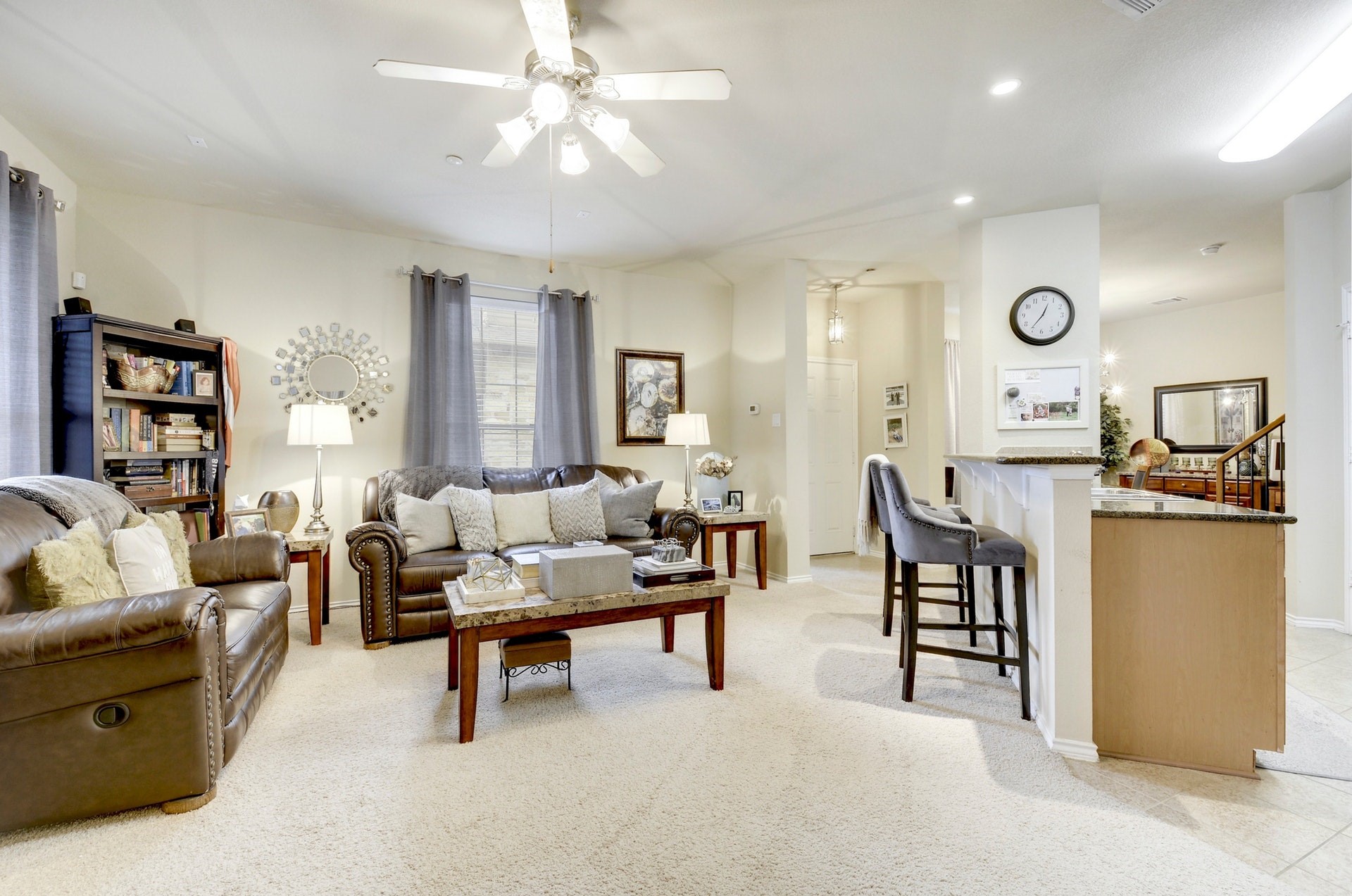 14815 Avery Ranch Boulevard, Unit 1103 Austin, TX 78717 - Photo 7 of 25 a living room with furniture and a chandelier