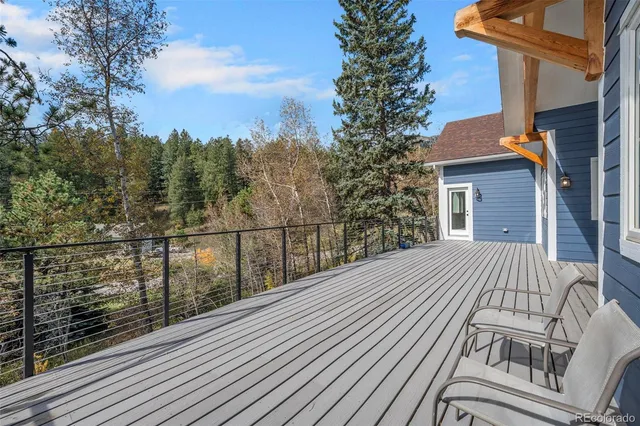 a view of a house with a roof deck