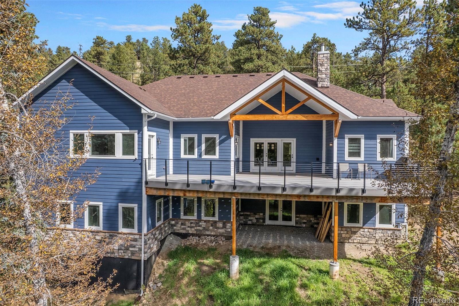 32 Oak Way Evergreen, CO 80439 - Photo 36 of 40 a view of a yard in front of house