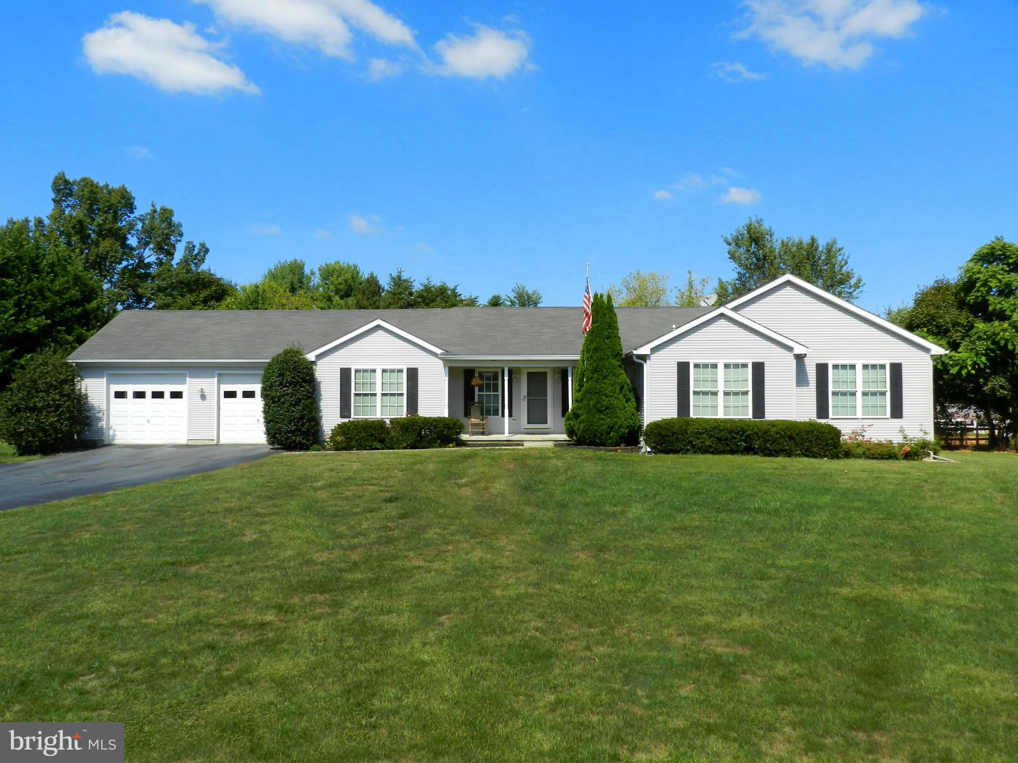 18401 Barnesville Road Barnesville, MD 20838 - Photo 1 of 30 a front view of a house with a yard and garage