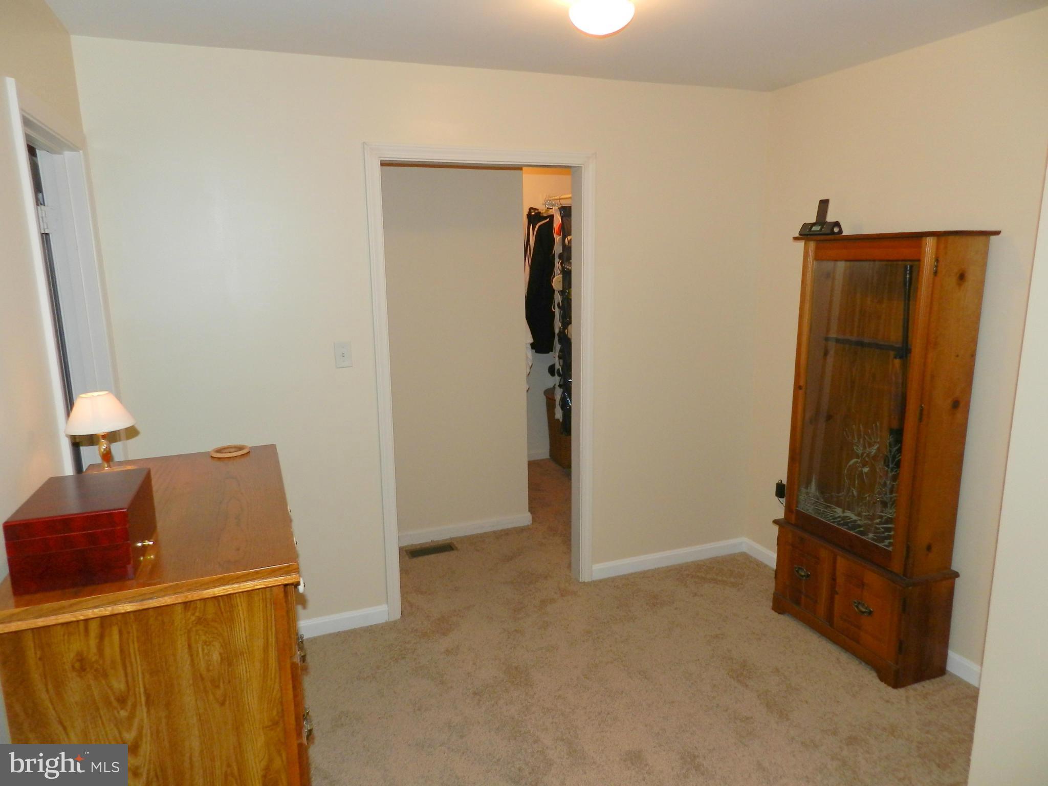 18401 Barnesville Road Barnesville, MD 20838 - Photo 18 of 30 a view of room with furniture and wooden floor