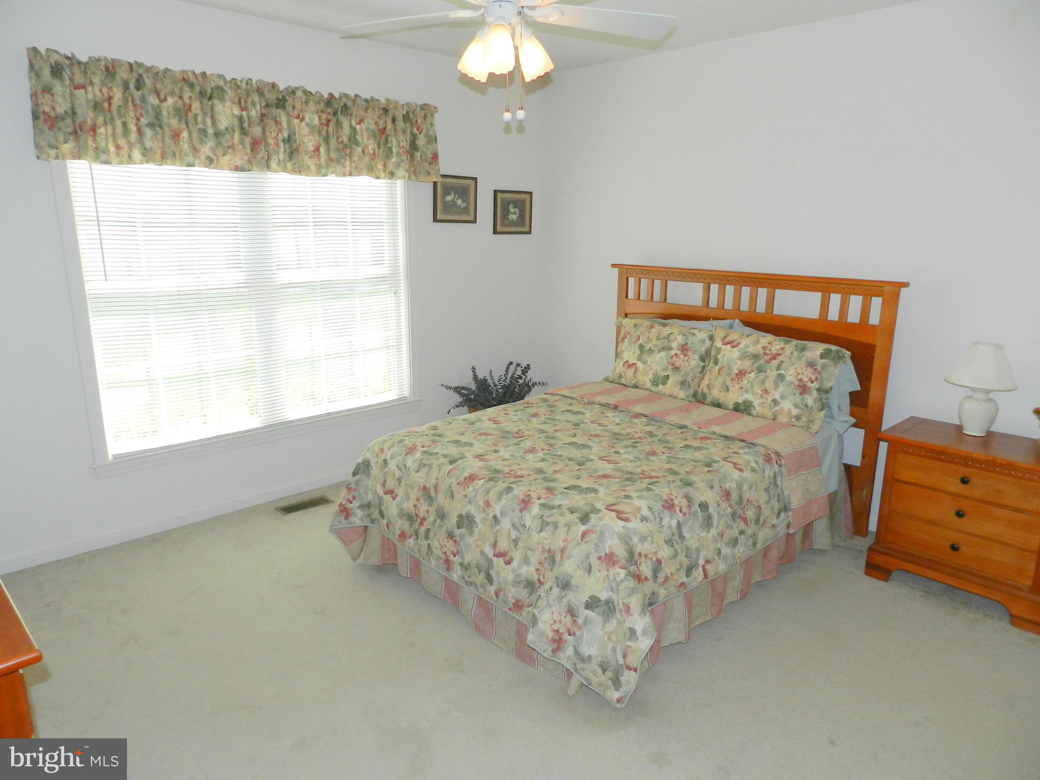 18401 Barnesville Road Barnesville, MD 20838 - Photo 20 of 30 a bedroom with a bed and a window