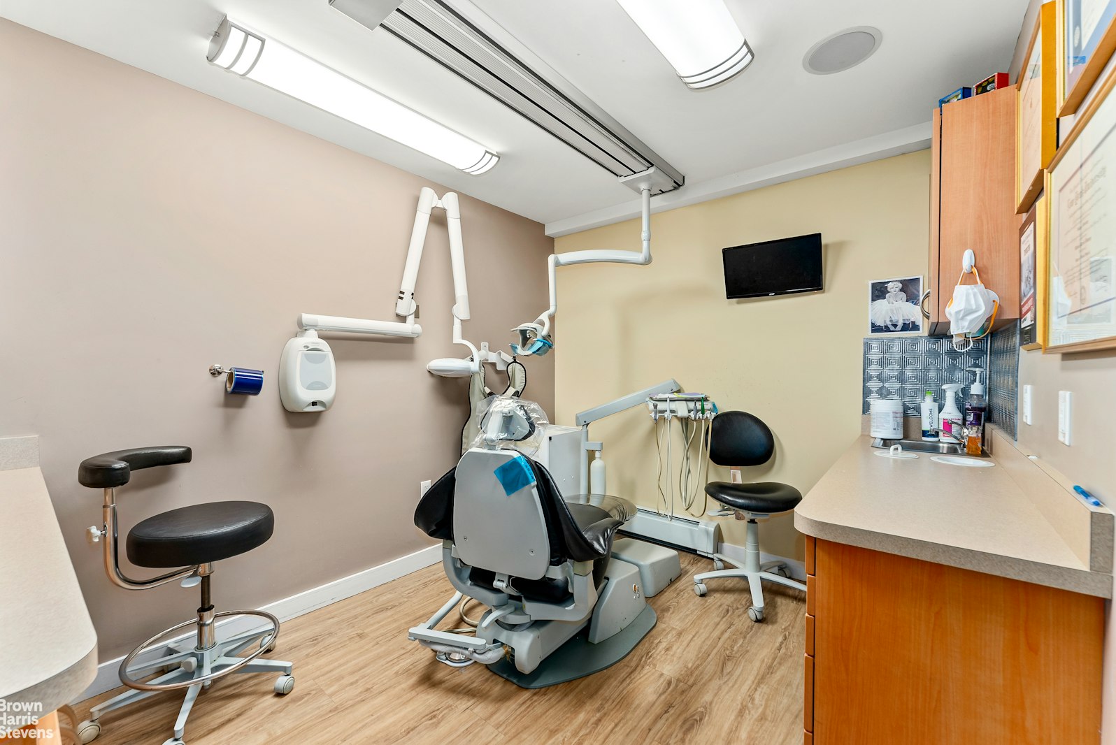 131 East 38th Street Manhattan, NY 10016 - Photo 25 of 26 a view of a kitchen with gym equipment