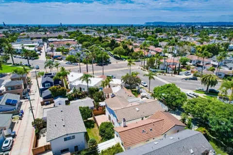 an aerial view of a house with a garden