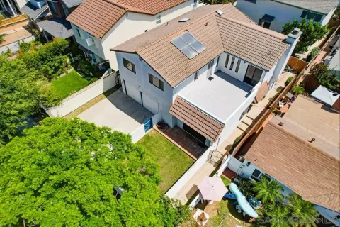 a front view of a house with a yard and porch
