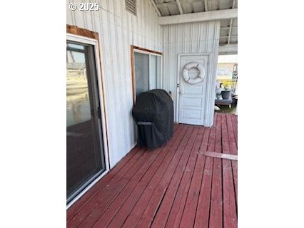 50350 Cowens Road, Unit 8 Scappoose, OR 97056 - Photo 3 of 8 a living room with wooden floor and furniture